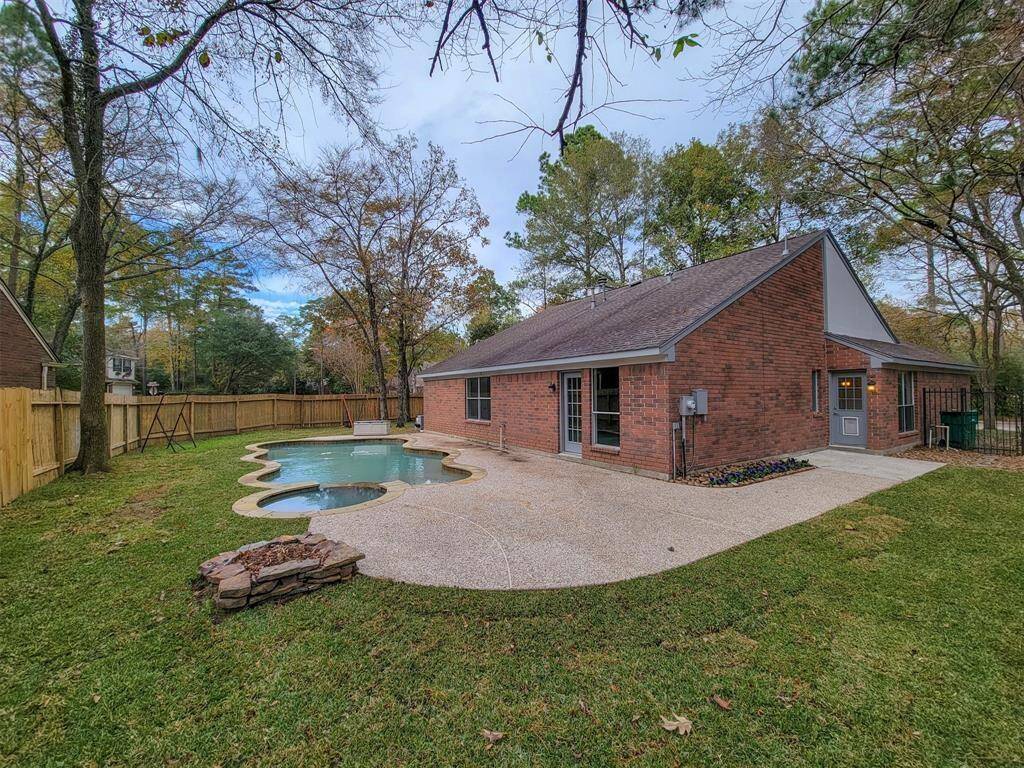 Nice sized backyard with a pool and spa!