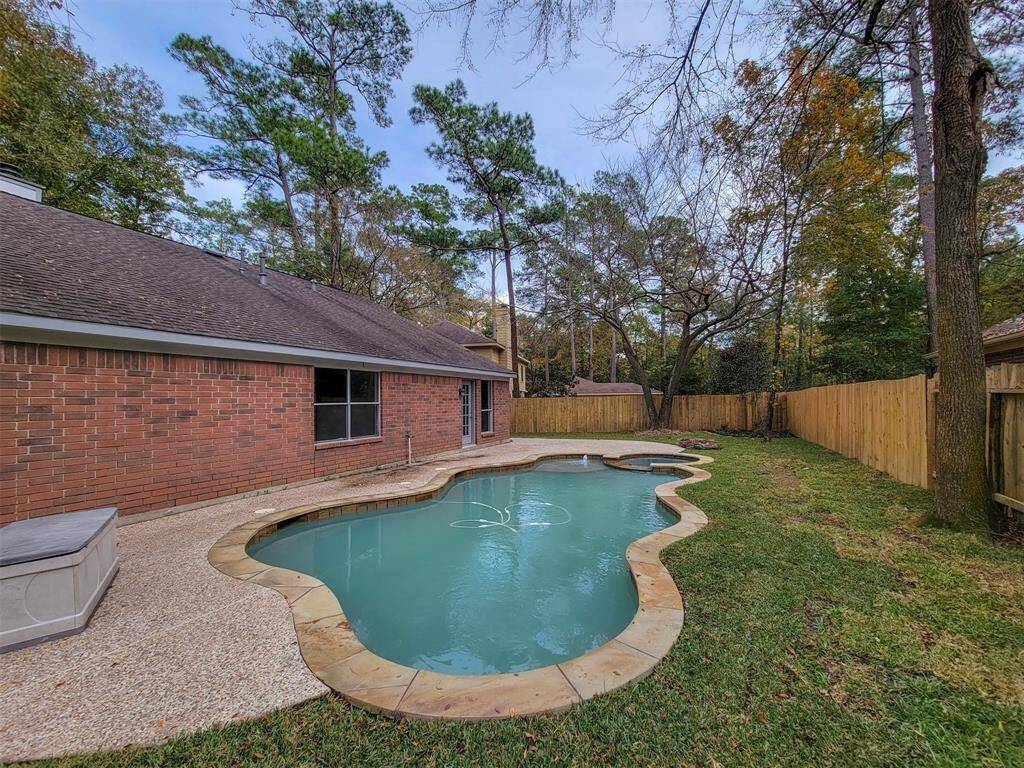 Extended patio space for outdoor entertaining pool-side.