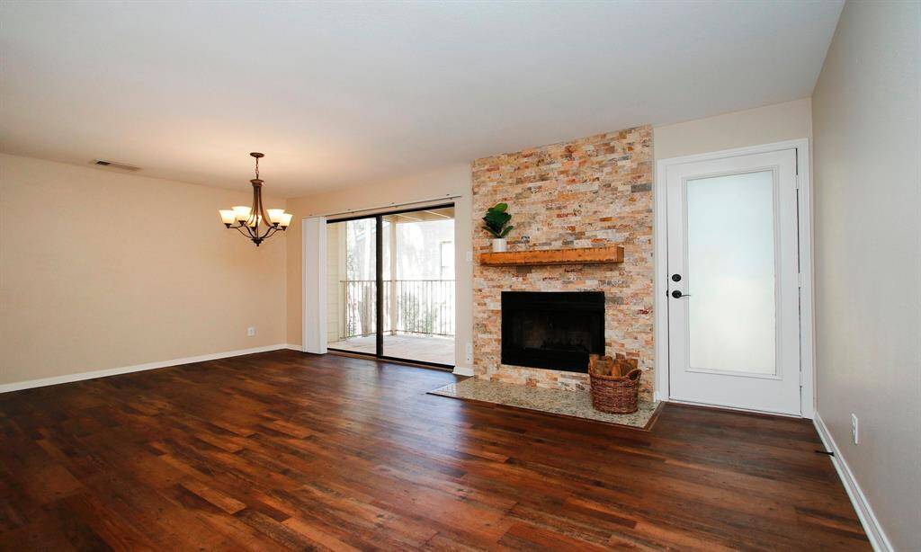 Welcome to this beautifully updated condominium in Creekwood Village, situated in the sought-after master-planned community of The Woodlands!