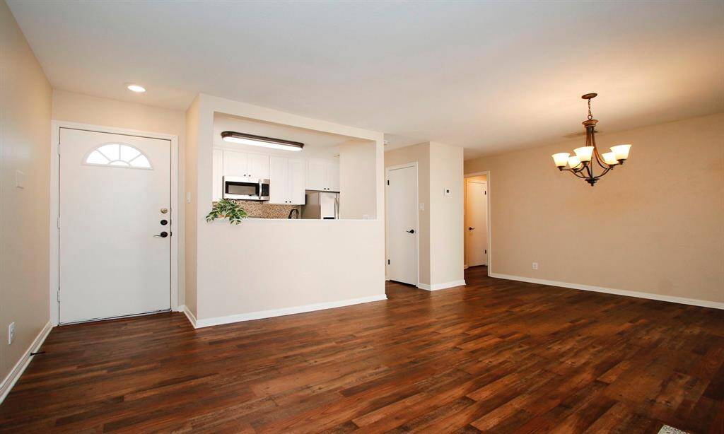 Another view of the living spacing, looking from the Living Room into the Dining Room.