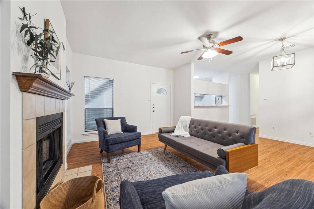 Note the classic mantle and updated ceiling fan.