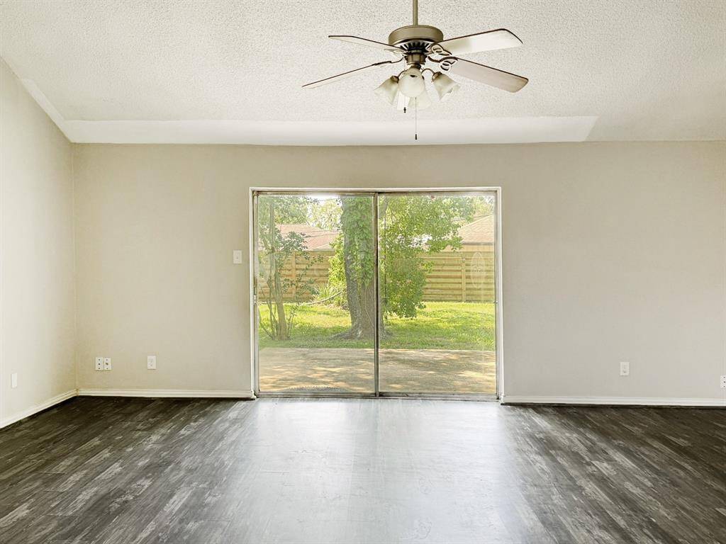 Large sliding door leading to backyard