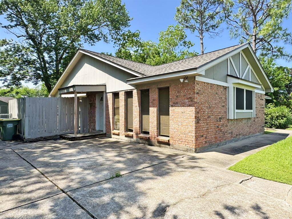 Driveway leading to converted garage.