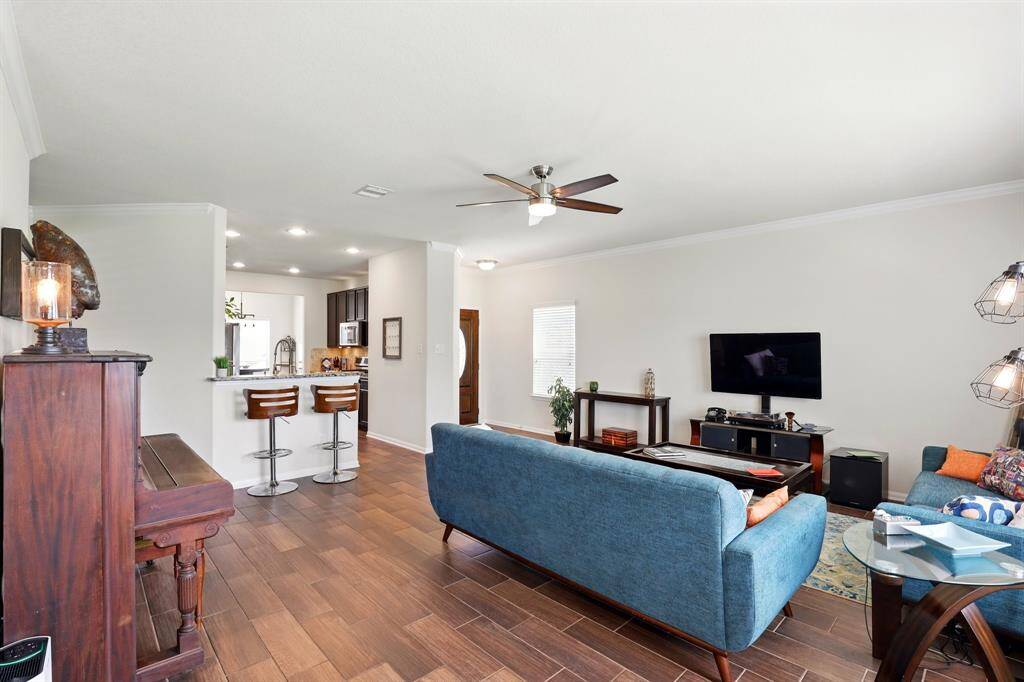 Experience seamless living with this inviting open floor plan, perfect for entertaining and everyday comfort.
