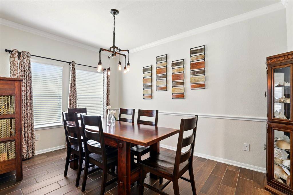 Elegant dining room seamlessly connected to the kitchen.