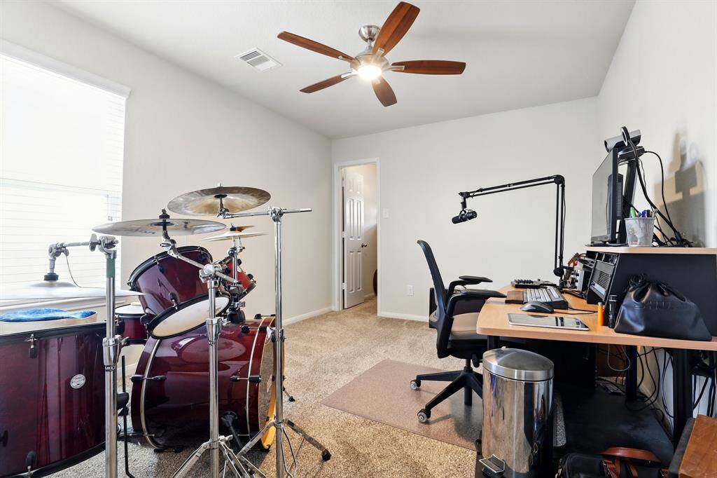 Secondary bedroom currently used as a music room!