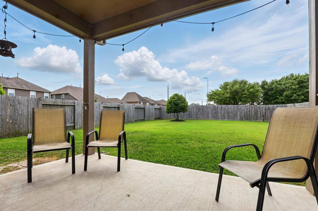 Enjoy ultimate privacy in this beautifully maintained backyard with no rear neighbors.