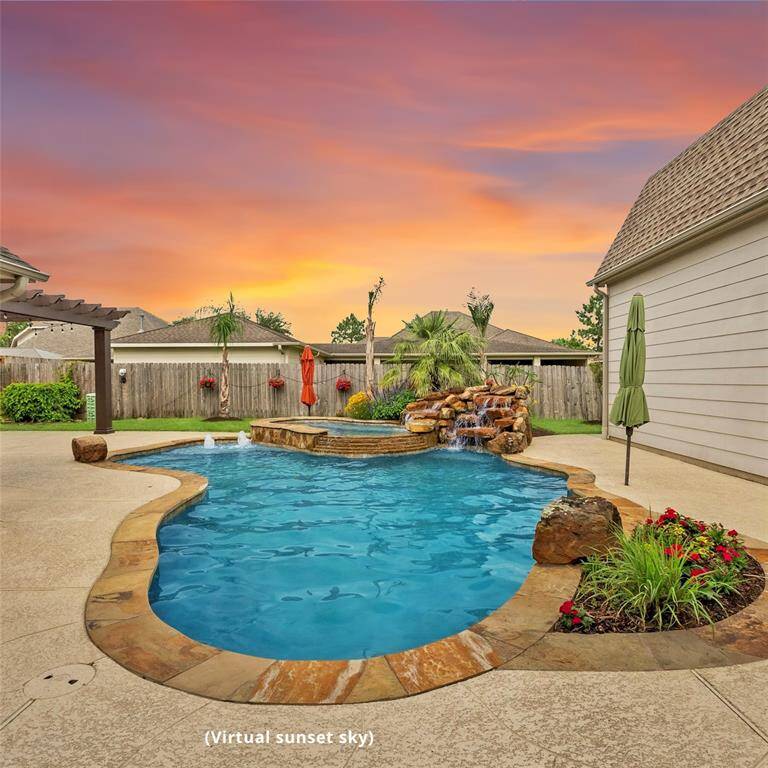 Your dream backyard awaits! The heated pool offers a beautiful double waterfall, an extra large spa and endless hours of recreation! The 22' x 14' windstorm-rated fiberglass pergola and Jenn-Air gas grill expand your entertainment options and invite you to relax or invite guests and celebrate your new move!