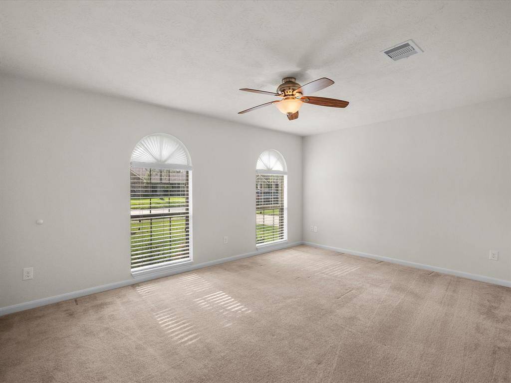 Bedroom #2 or study, is approx 12' x 17' and enjoys the double windows, natural light and view of the front yard.