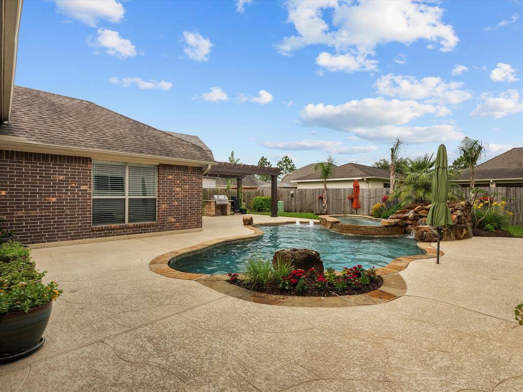 View of backyard from the gate.  Notice that there are no neighboring windows.  Enjoy the privacy of your backyard.