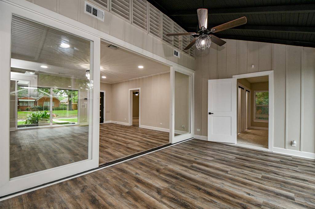 Family Room flowing into gameroom/flexroom entertainment space gracefully.