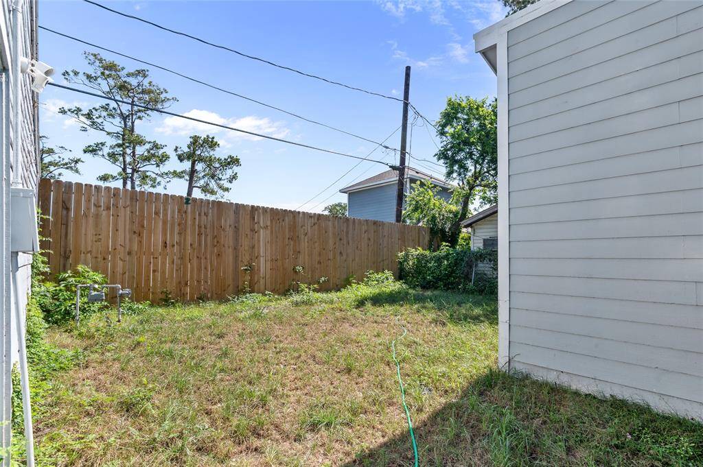 Private backyard with newly added privacy fence.
