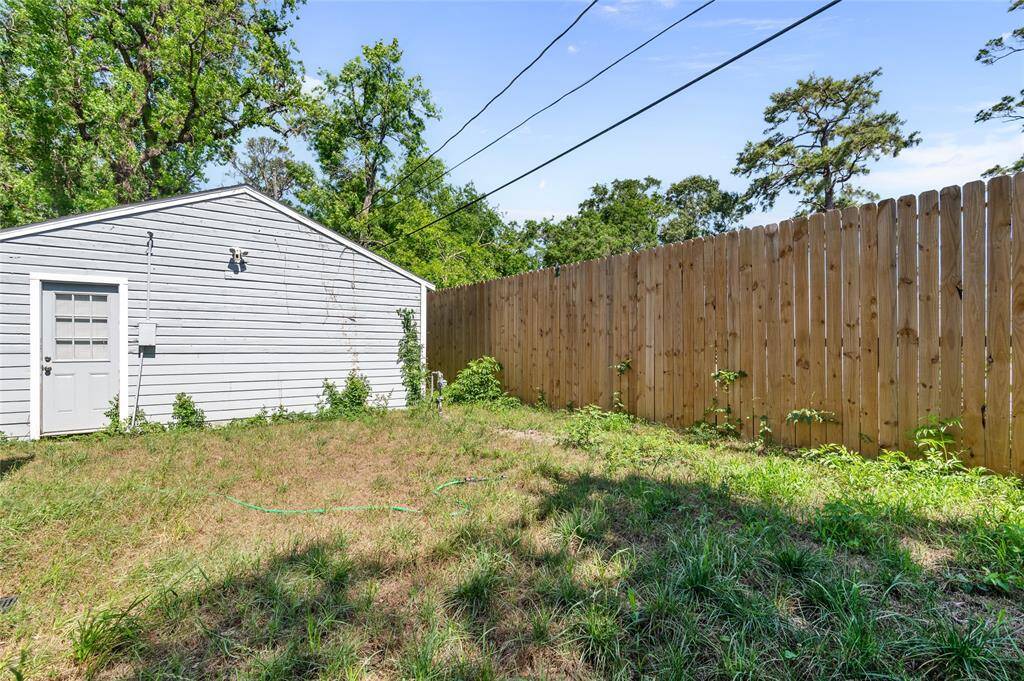 Private backyard with newly added privacy fence.