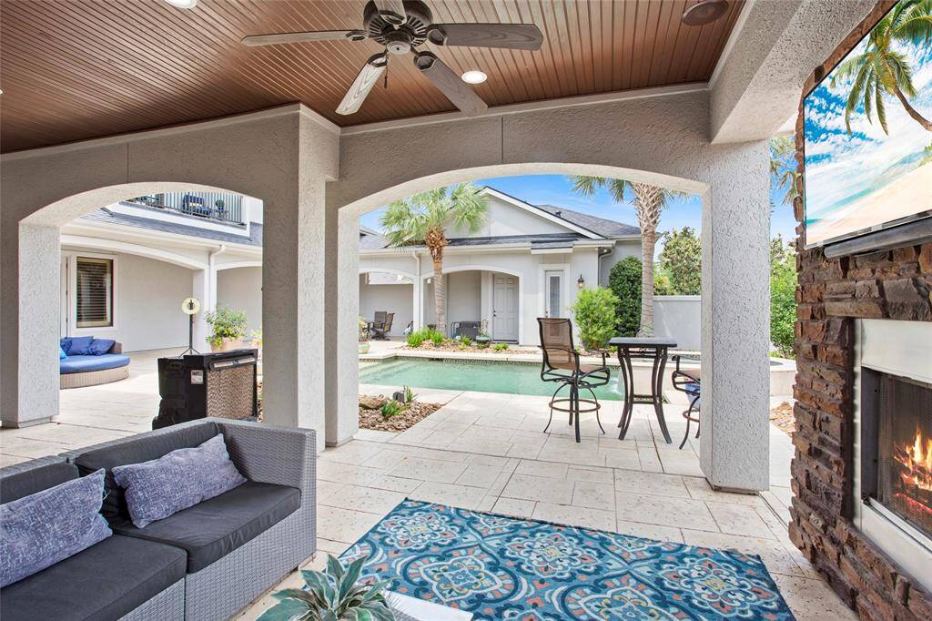 Ceilings finished with tongue and grove wood, lighting, fans and completed with full 2-zone outdoor speaker system.