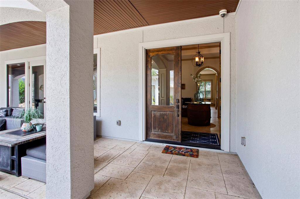 Double solid wood doors welcome you into your beautiful home.