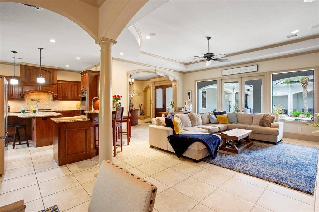 Open feel between family room, dining and kitchen.