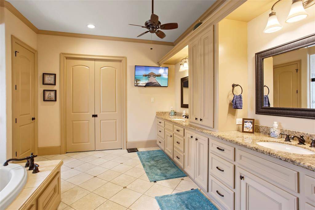 His/Hers sink areas with plenty of storage.