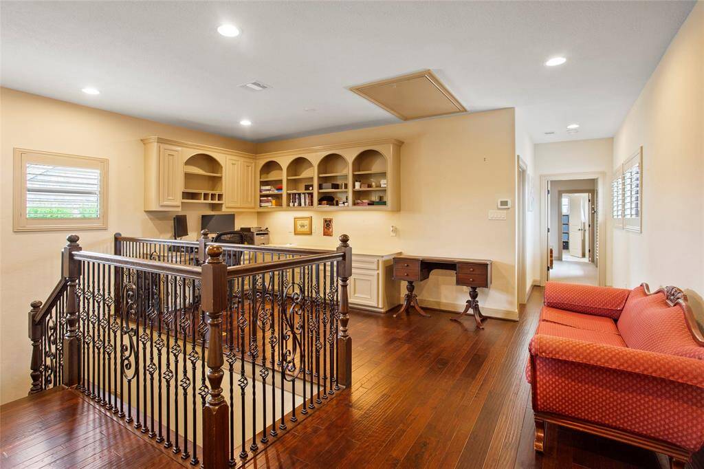 Built in Home Office upstairs with solid wood flooring.
