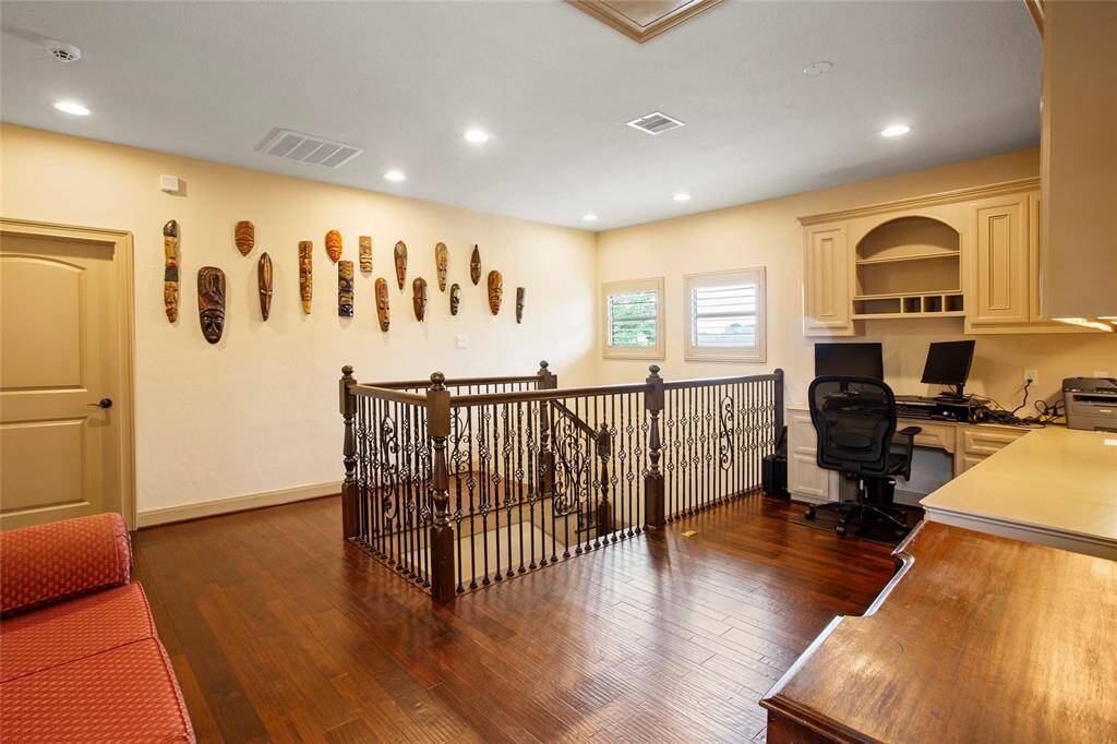 Door at the top of the stairs leads to a HUGE air conditioned storage room.