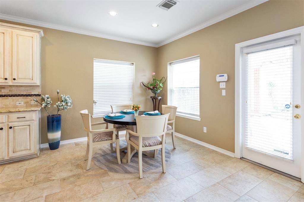 Bright and inviting breakfast nook with abundant natural light.