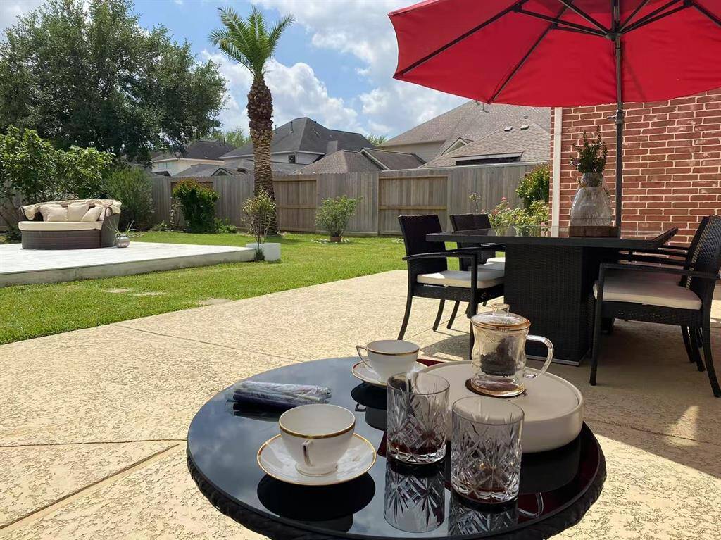 Savor afternoon tea in your stunning backyard oasis.