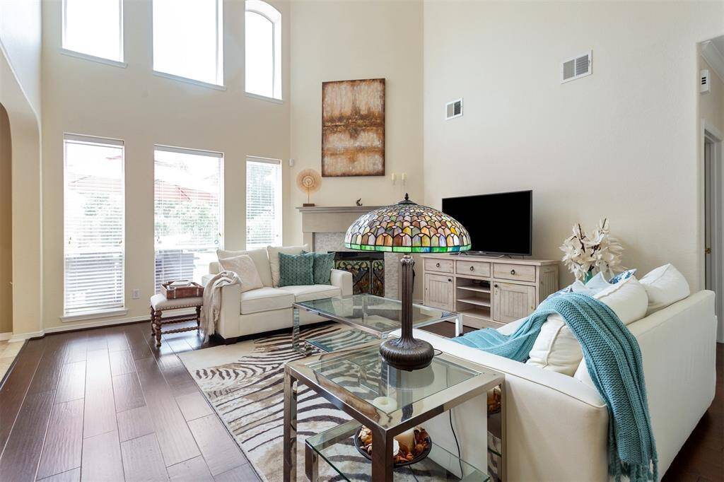Experience airy elegance with soaring ceilings and abundant natural light.
