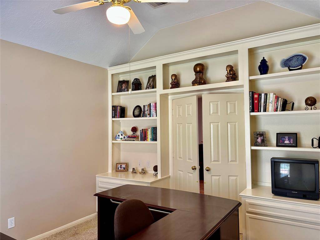 Access the office through double doors from the family room.