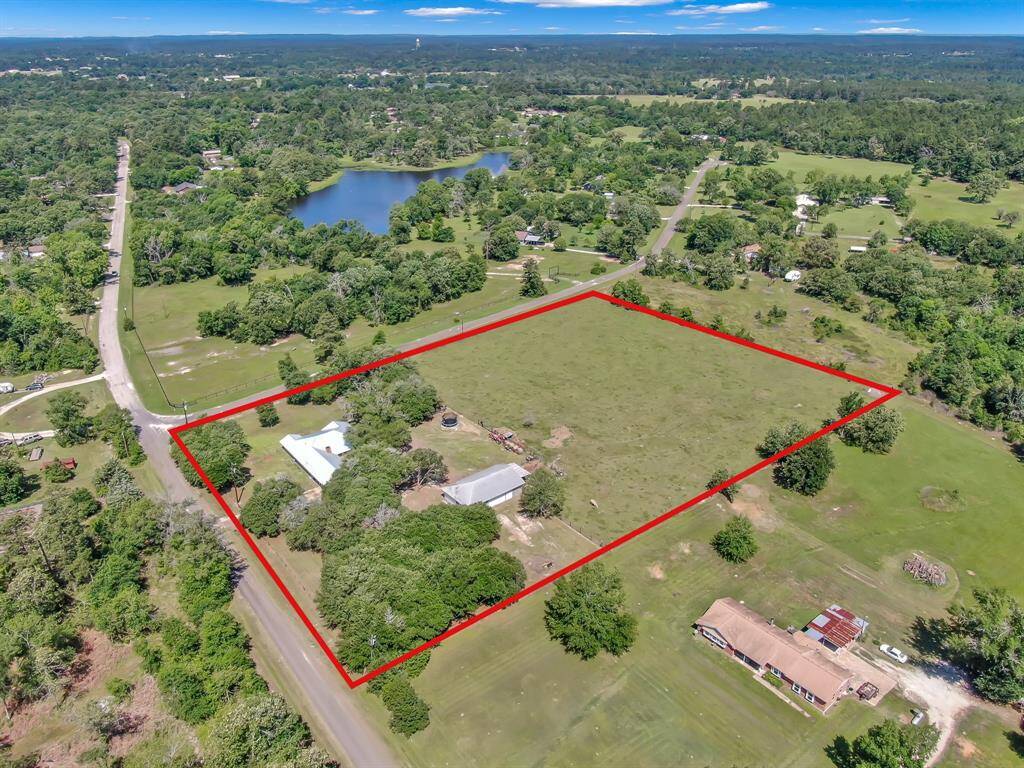 Spacious property with a mix of open fields and mature trees, offering privacy and potential for all your dreams. Perfect for those seeking a peaceful, expansive setting.