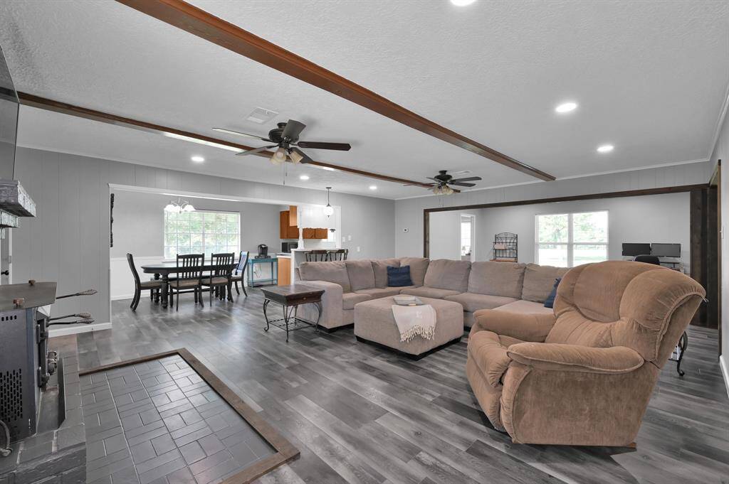 Open layout, exposed beams featuring many updates
