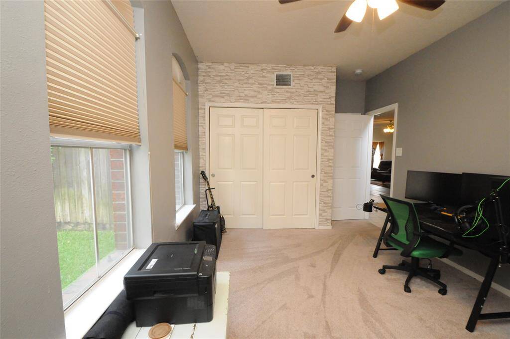 Don't need a home office?  This room would make an ideal guest or mother in-law suite