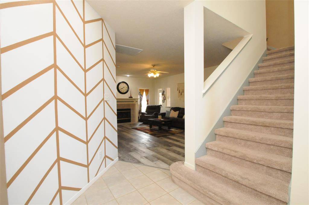 Custom accent wall from the entry into the family room