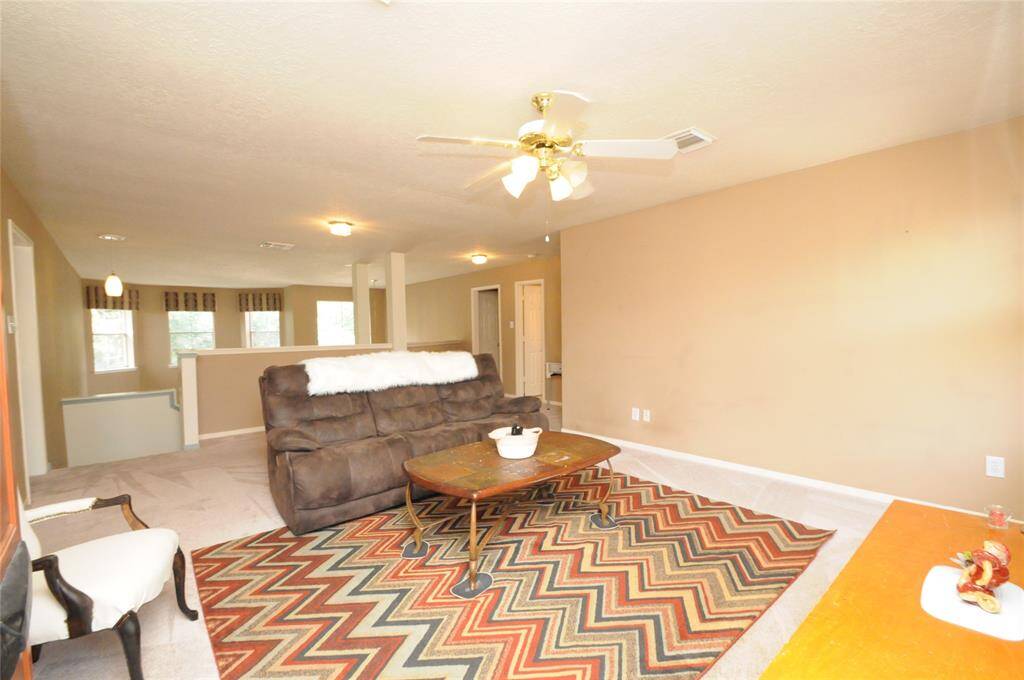 Another view of the spacious gameroom back towards the stairs