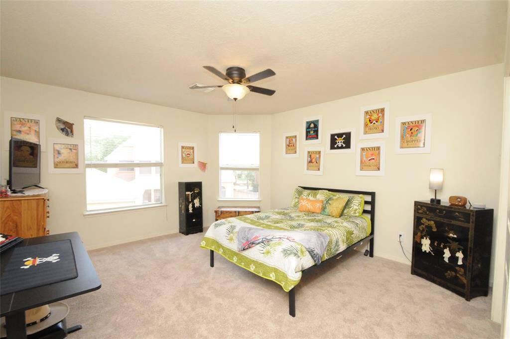 1 of 3 secondary bedrooms on the 2nd floor offers plenty of space for bedroom furniture, desk, dresser, etc.