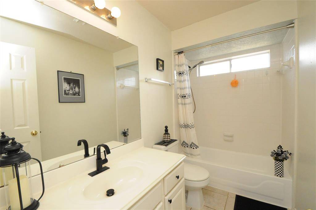One of the two full baths upstairs