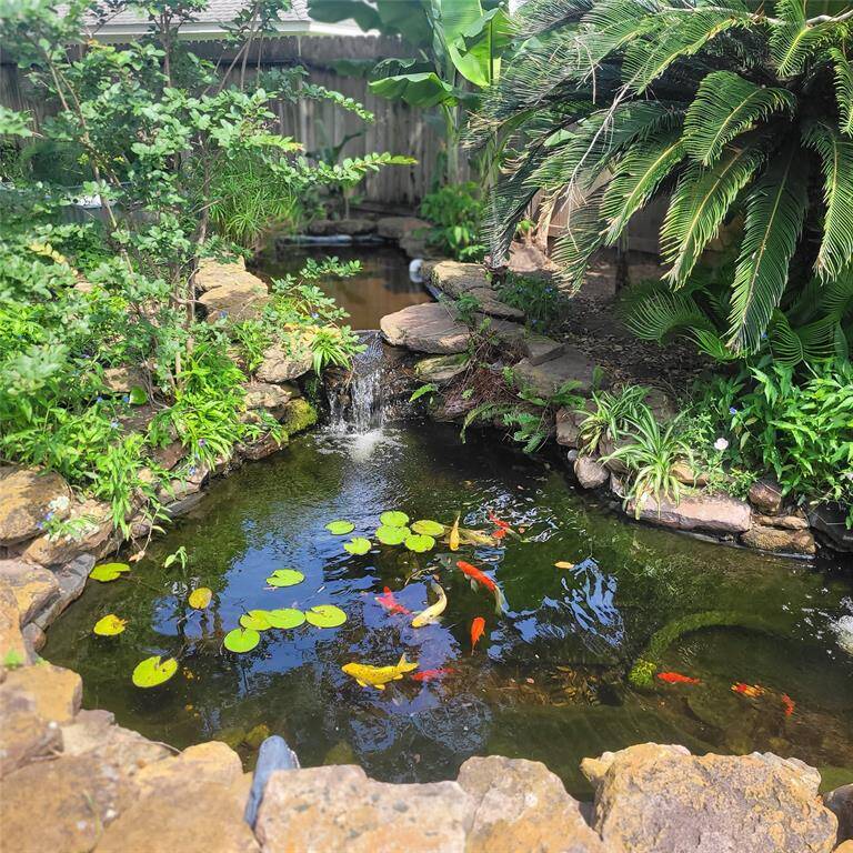 Your own tranquil Koi pond surrounded by lush greenery