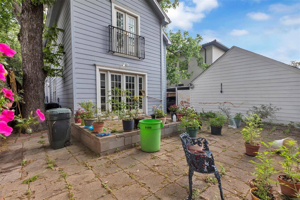 Another angle of the backyard patio, giving you a better perspective to envision your ideal outdoor setup.