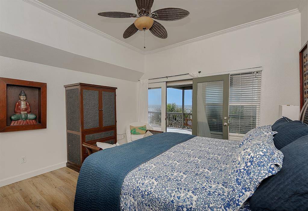 main bedroom with an in-suite bathroom, private deck, two walk in closets and amazing views of the gulf