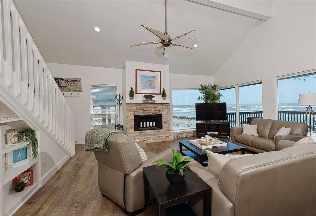 living room with vaulted ceilings