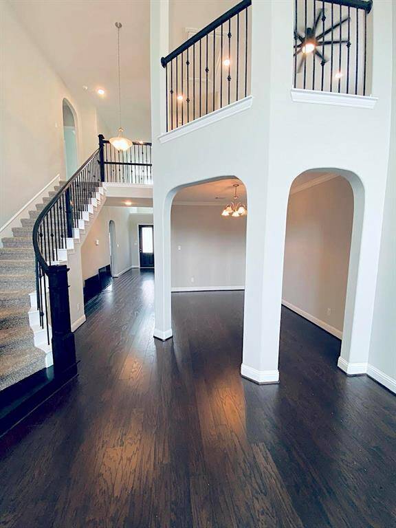 Stairway to second floor from livingroom view