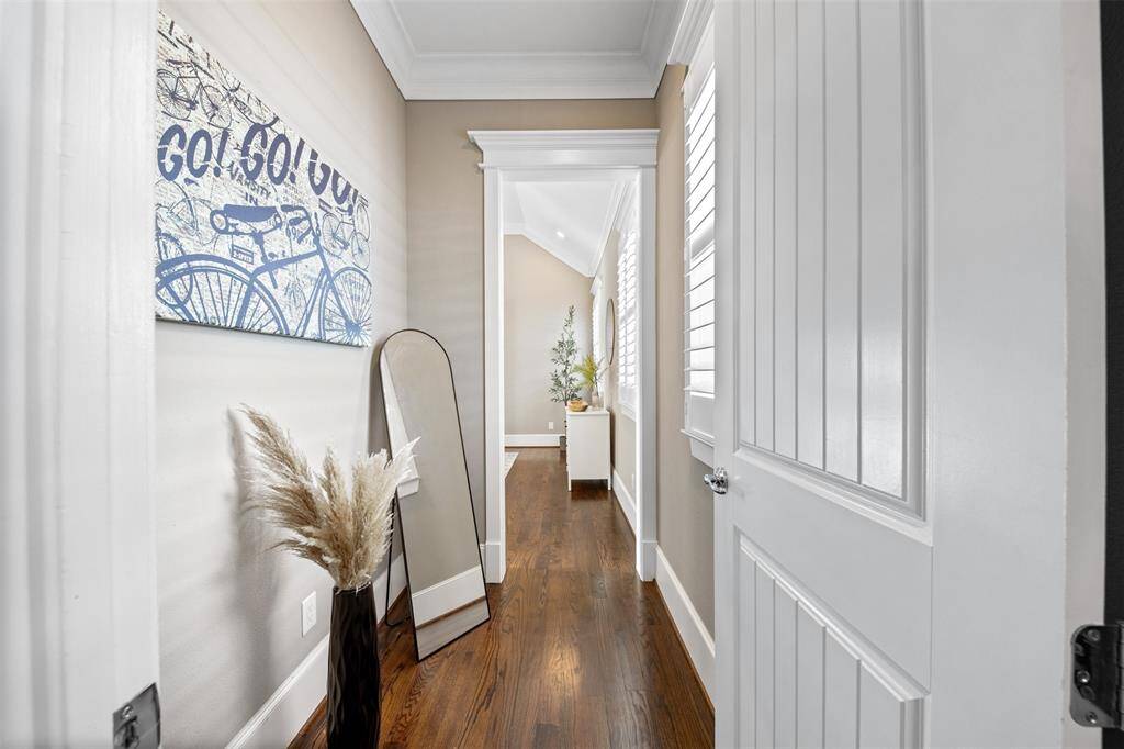 Experience refined craftsmanship with expansive ceilings, wide-plank hardwoods, and luxury trim work in every room.