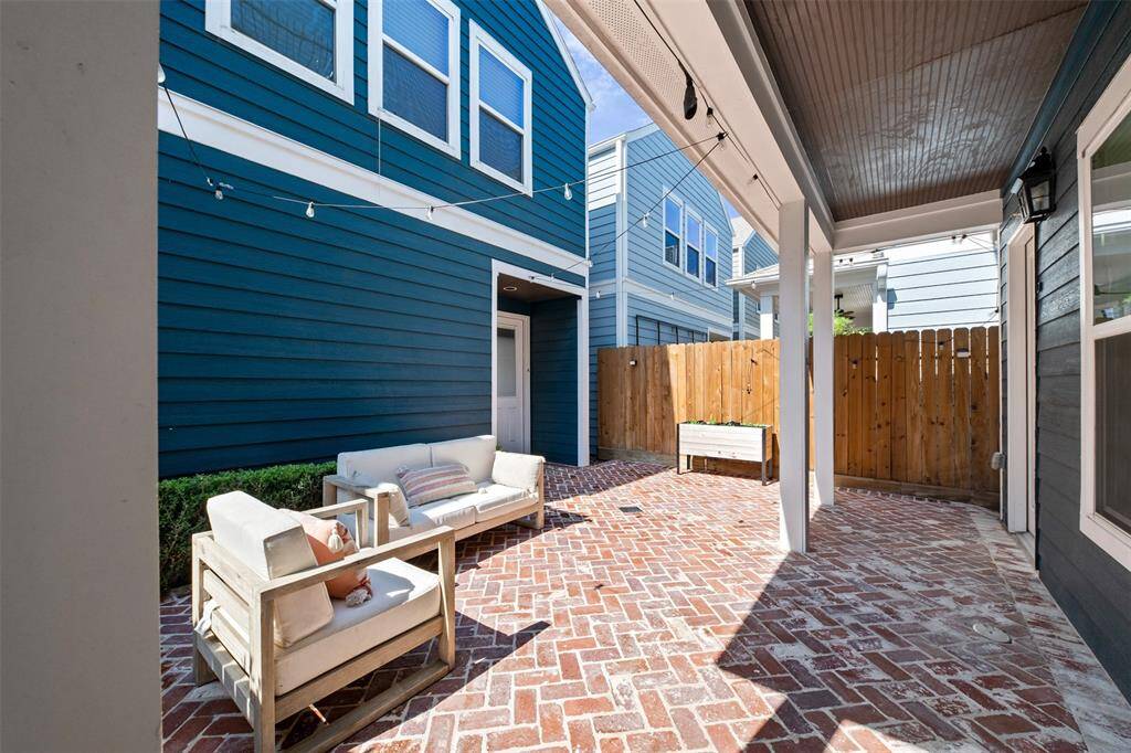 The spacious backyard patio is an entertainer’s dream, offering plenty of room for outdoor dining, lounging, and evening gatherings.