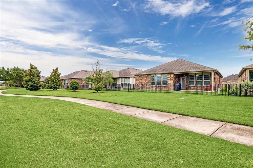 Enjoy refreshing breezes in this inviting backyard setting.