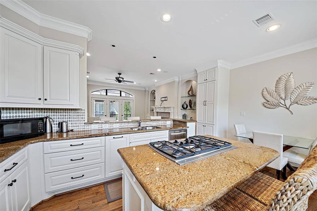 Spacious Kitchen w/ dishes, pots, bowls, silverware . . .