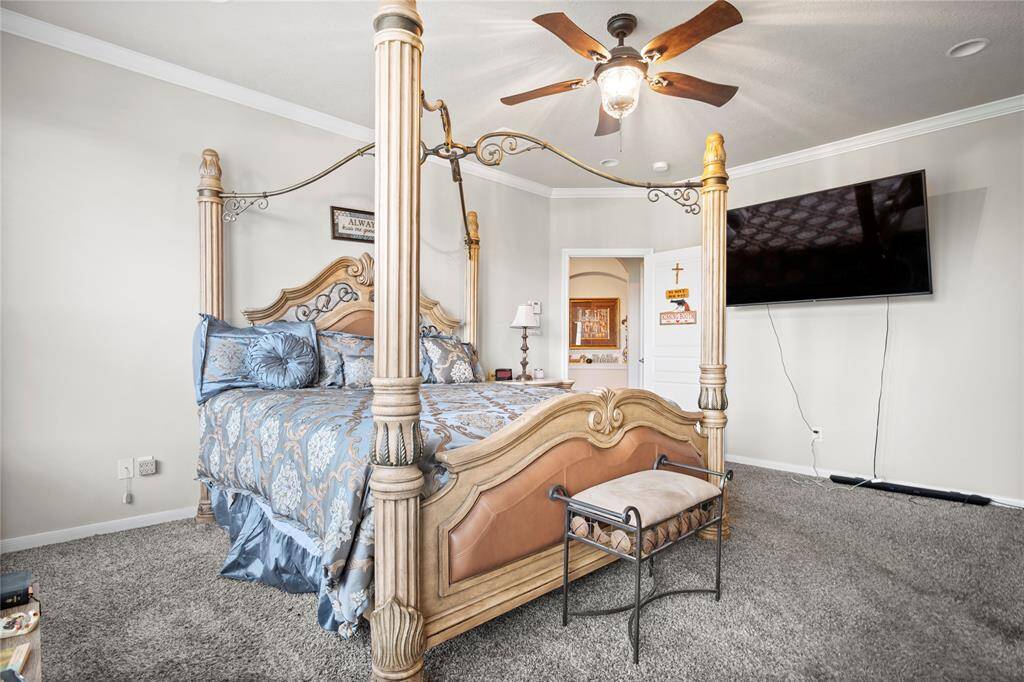 The room boasts high ceilings and plus carpet, making it the perfect personal escape.
