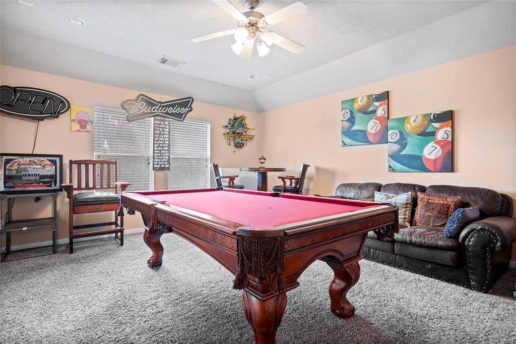Spacious upstairs game room—plenty of room for a pool table, movie nights, or family fun!