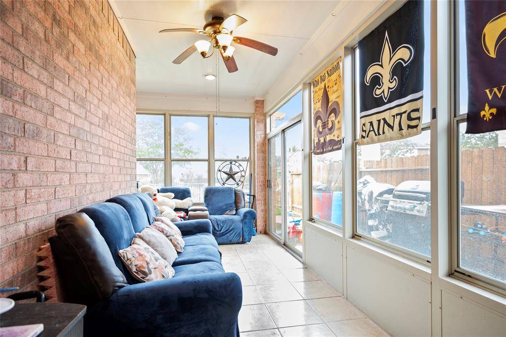 Enjoy the beauty of the outdoors with all the comforts of indoor living in this fully enclosed patio, complete with its own dedicated A/C