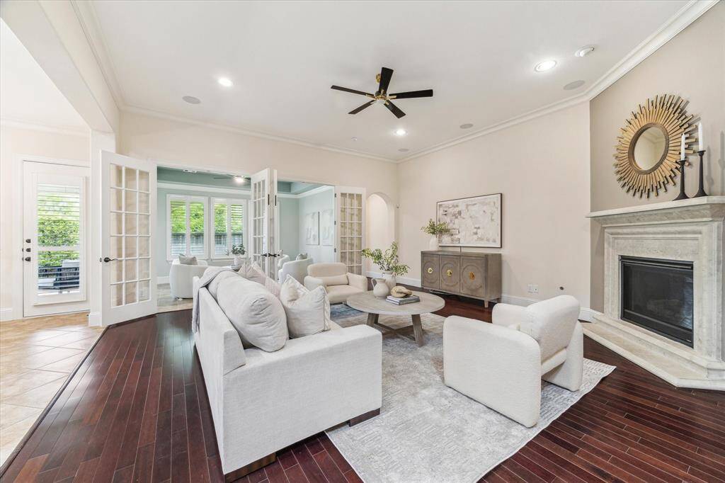 Love the feel and flow from the family room to the bright sunroom.
