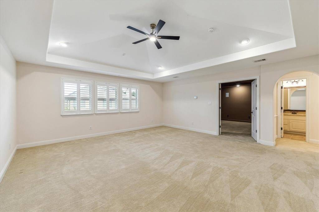 Game room seamlessly connects to the media room, creating a fun and functional space perfect for entertaining and for keeping all the toys upstairs and out of sight.