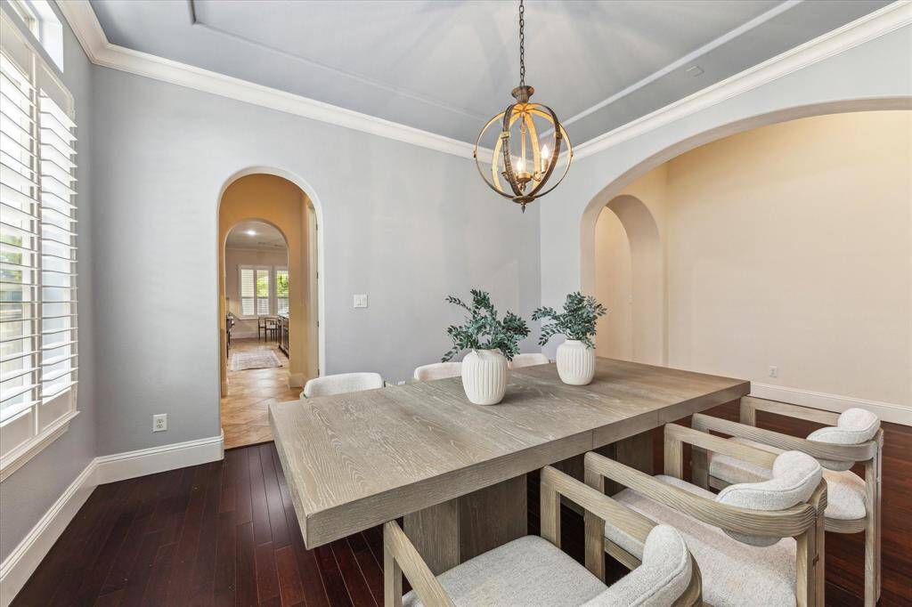 Dining flows easily into the kitchen through the butler's pantry.
