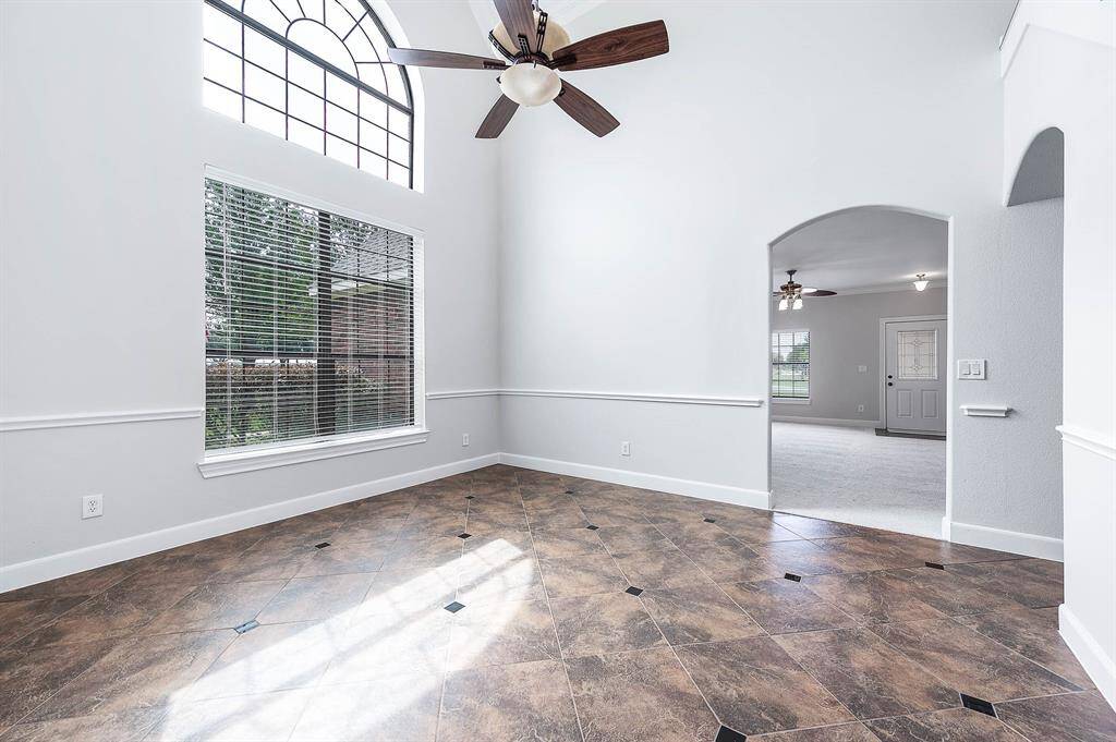 Dining room with beautiful high ceilings and lots of natural light